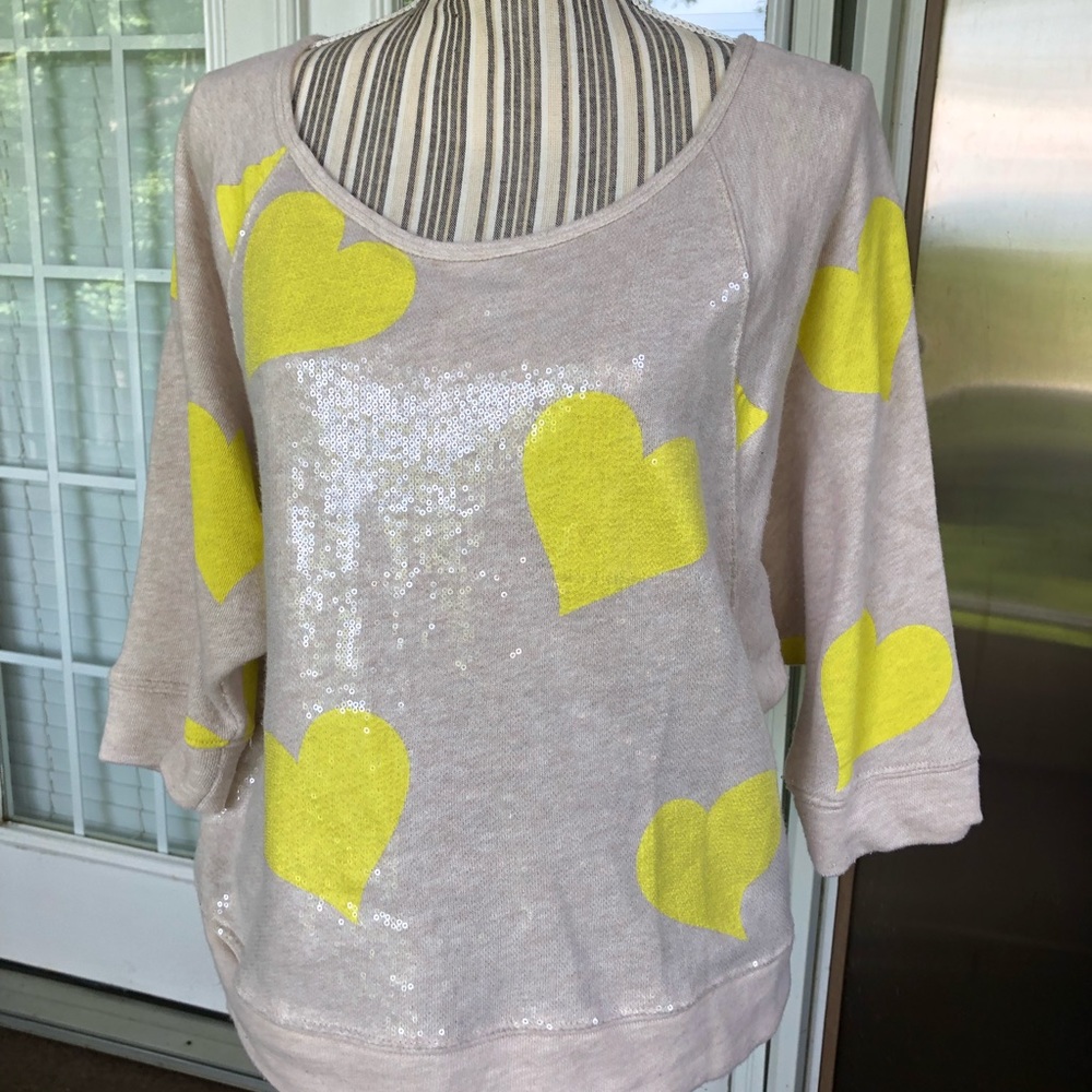 Super cute! Sequin embellished with yellow hearts
